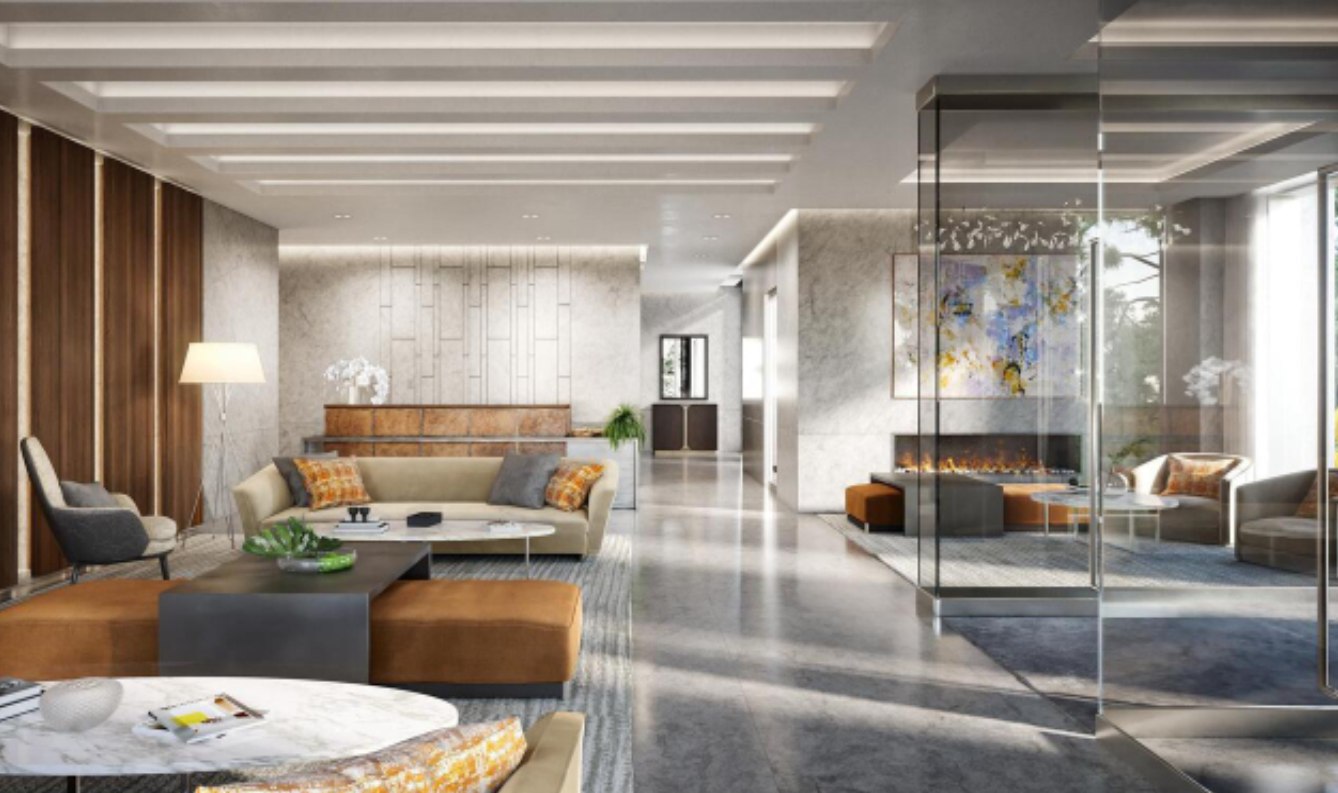 Robinson Landing residential lobby interior in Old Town Alexandria Virginia &mdash; sophisticated design featuring warm wood paneling, honed marble feature wall, contemporary fireplace, custom area rugs, and curated artwork by Barbara D. Currie.